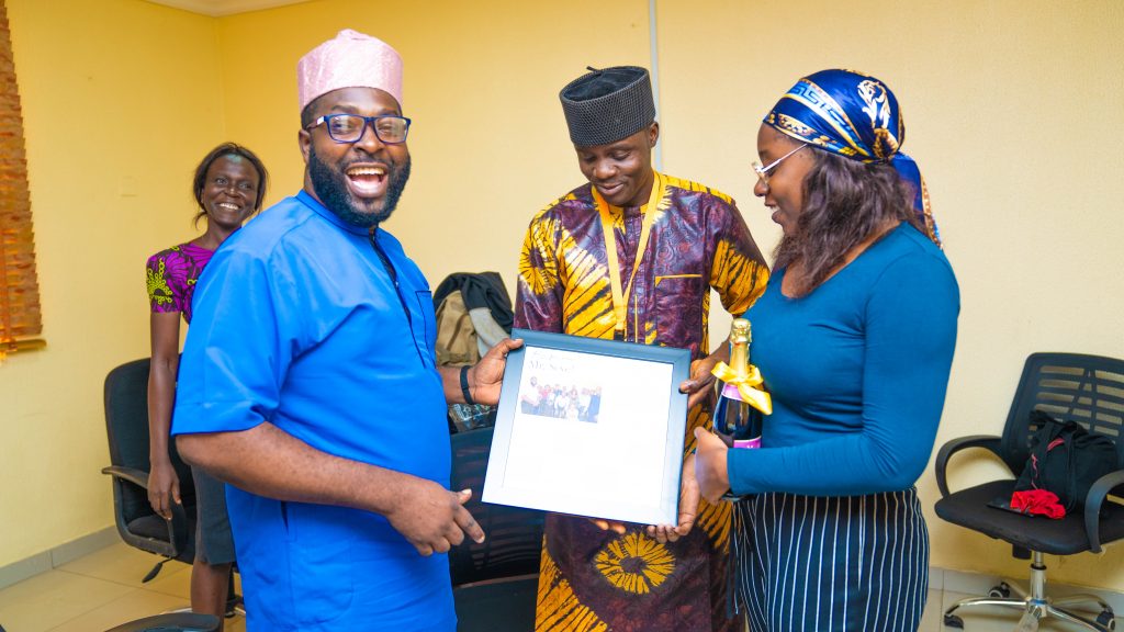 Presentation of farewell gifts by Osione and Akindele